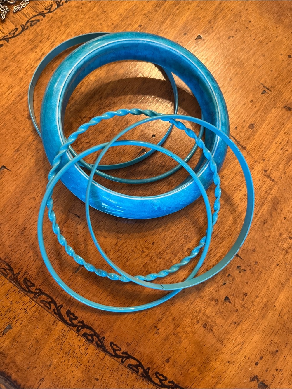 Acrylic and metal turquoise colored bangles